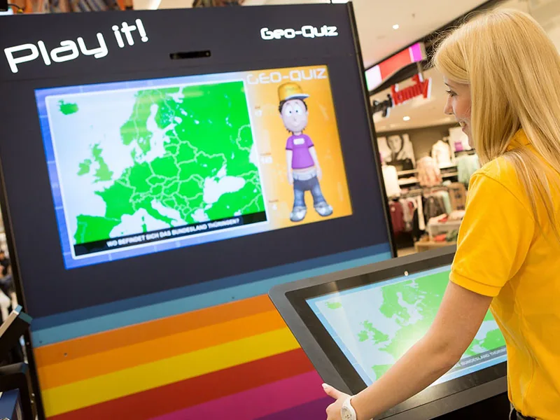 Visitor playing the interactive ECE Play it! Geo Quiz with virtual host Felix