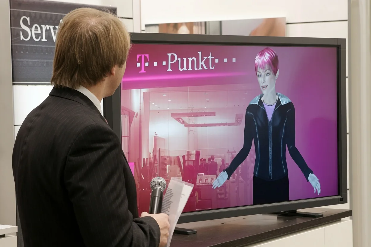 Interactive Deutsche Telekom avatar at a T-Punkt location in dialogue with a presenter